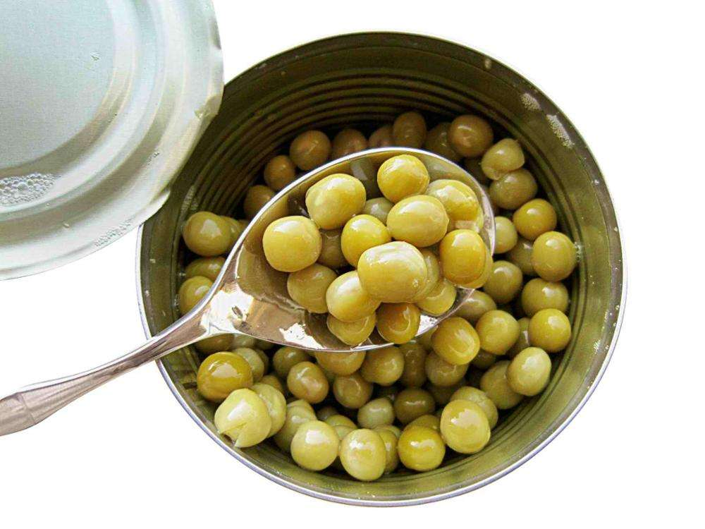 Guisantes verdes enlatados naturales y nutritivos, vegetal enlatado conveniente