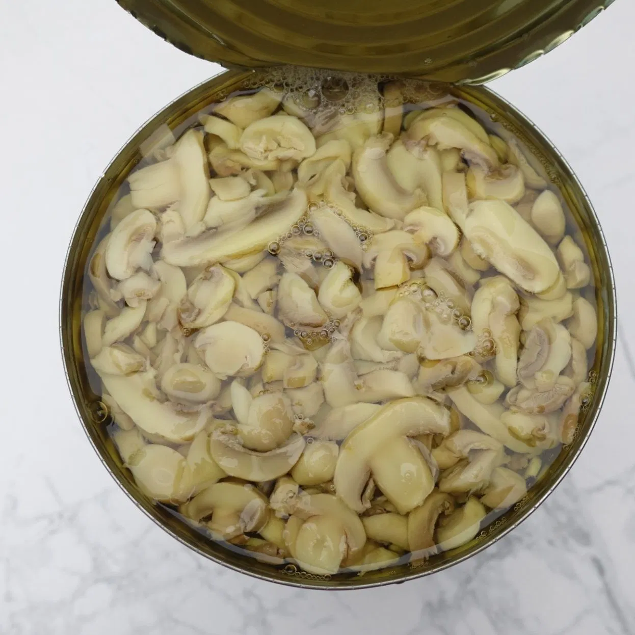 Champiñón de China en lata o frasco de vidrio de fábrica