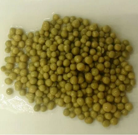 Guisantes verdes enlatados altamente deliciosos