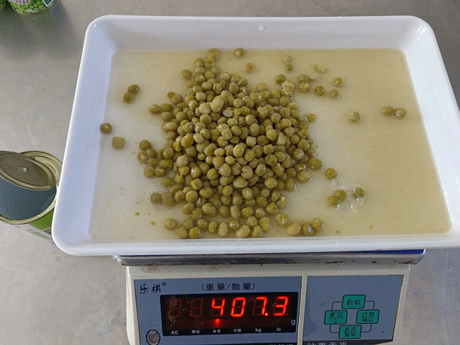Conservas de fábrica china, guisantes verdes en salmuera