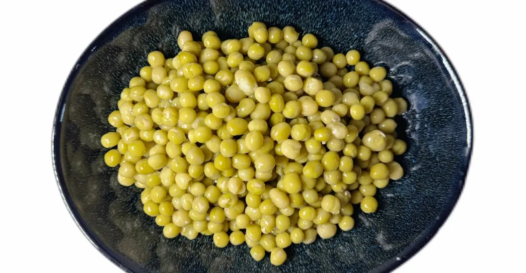 Guisantes verdes enlatados naturales y nutritivos, vegetal enlatado conveniente