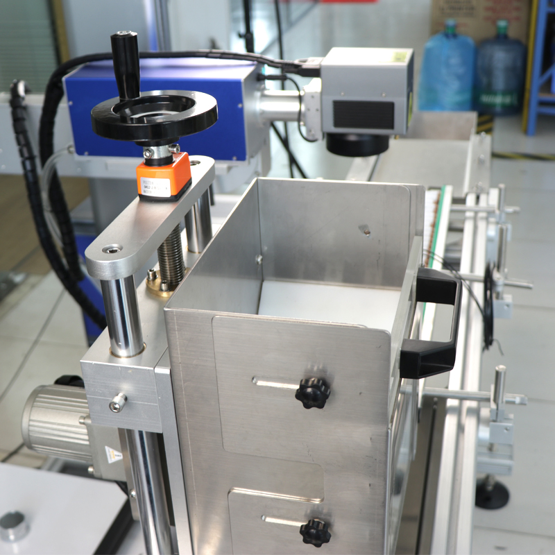 Automatic Vibratory Bowl Feeding &amp; UV Laser Marking System for Eyebrow Pencil Traceability