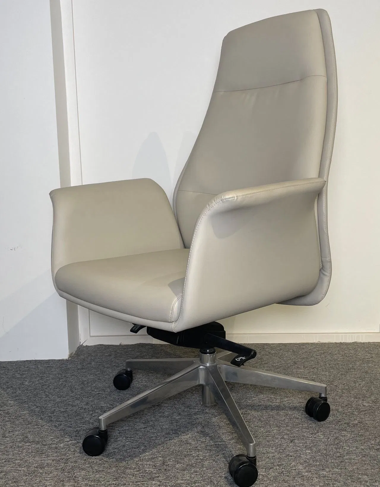 Ergonomic Leather Office Chair with Adjustable Height and Wheels