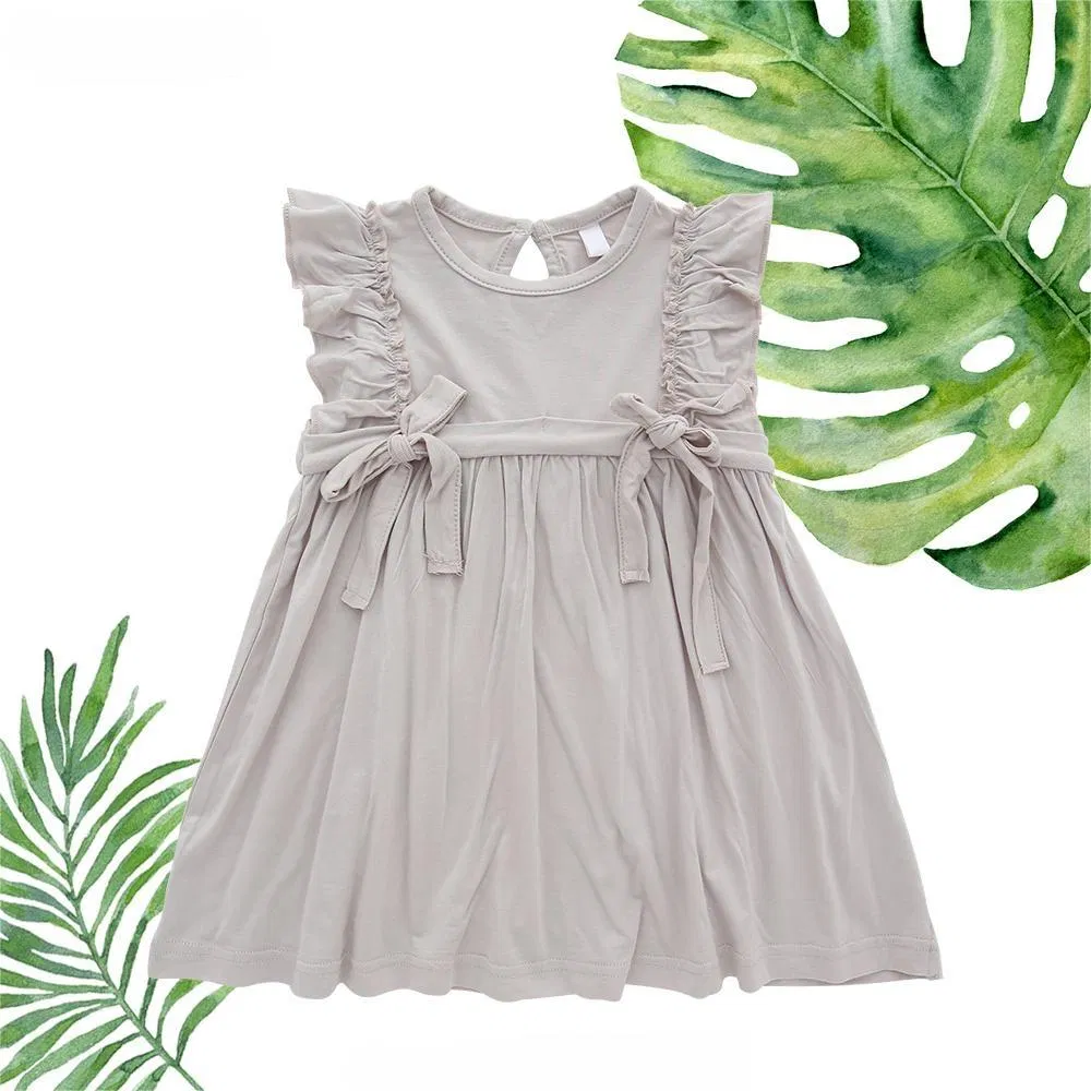 Vestido sin mangas de color liso de verano para niñas pequeñas con volantes y lazo