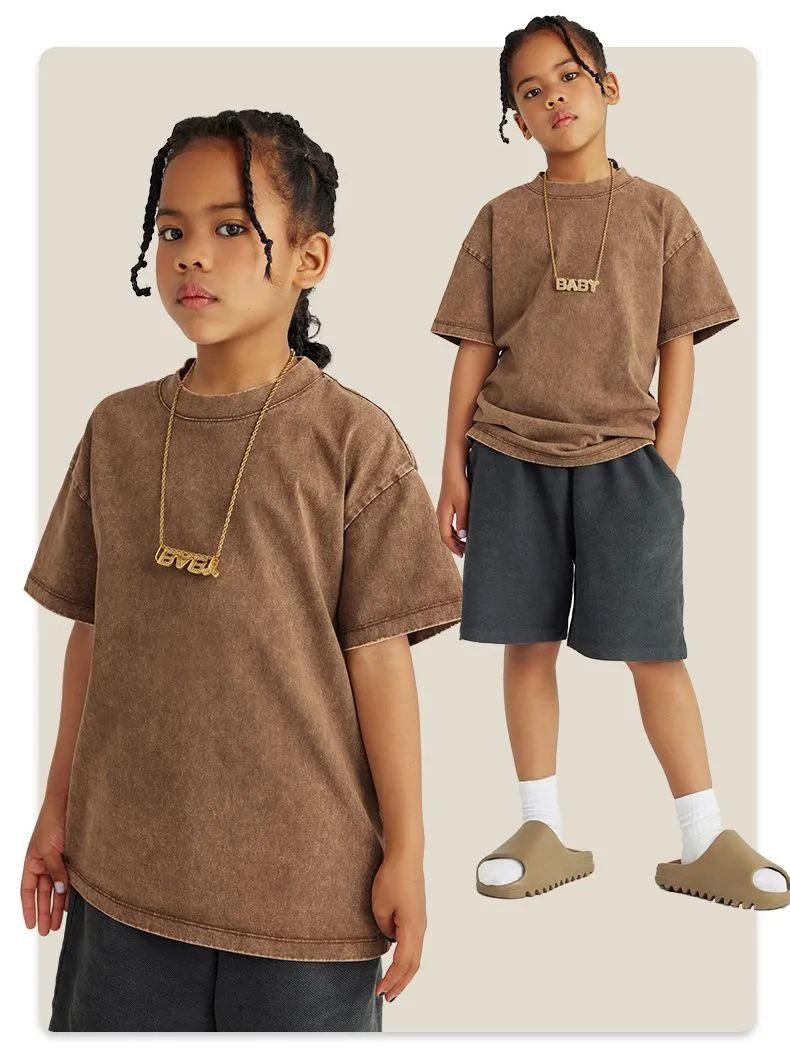Camiseta de algodón lavada a la moda para niños de verano personalizada al por mayor 270GSM 100% Camiseta para niños con hombros caídos, camiseta vintage de lavado ácido para niños y niñas