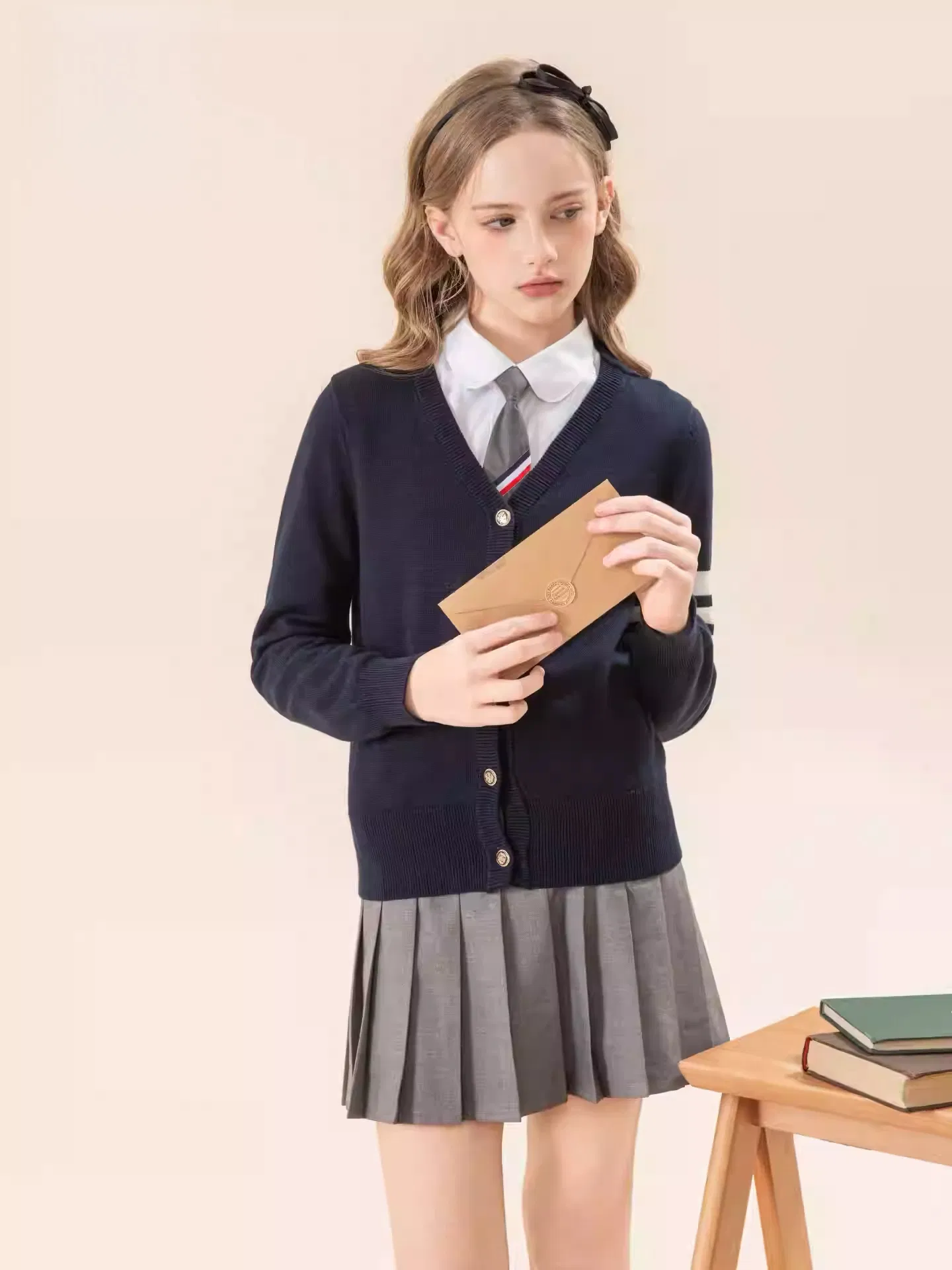 Uniforme escolar formal para niños y niñas con insignia bordada personalizada