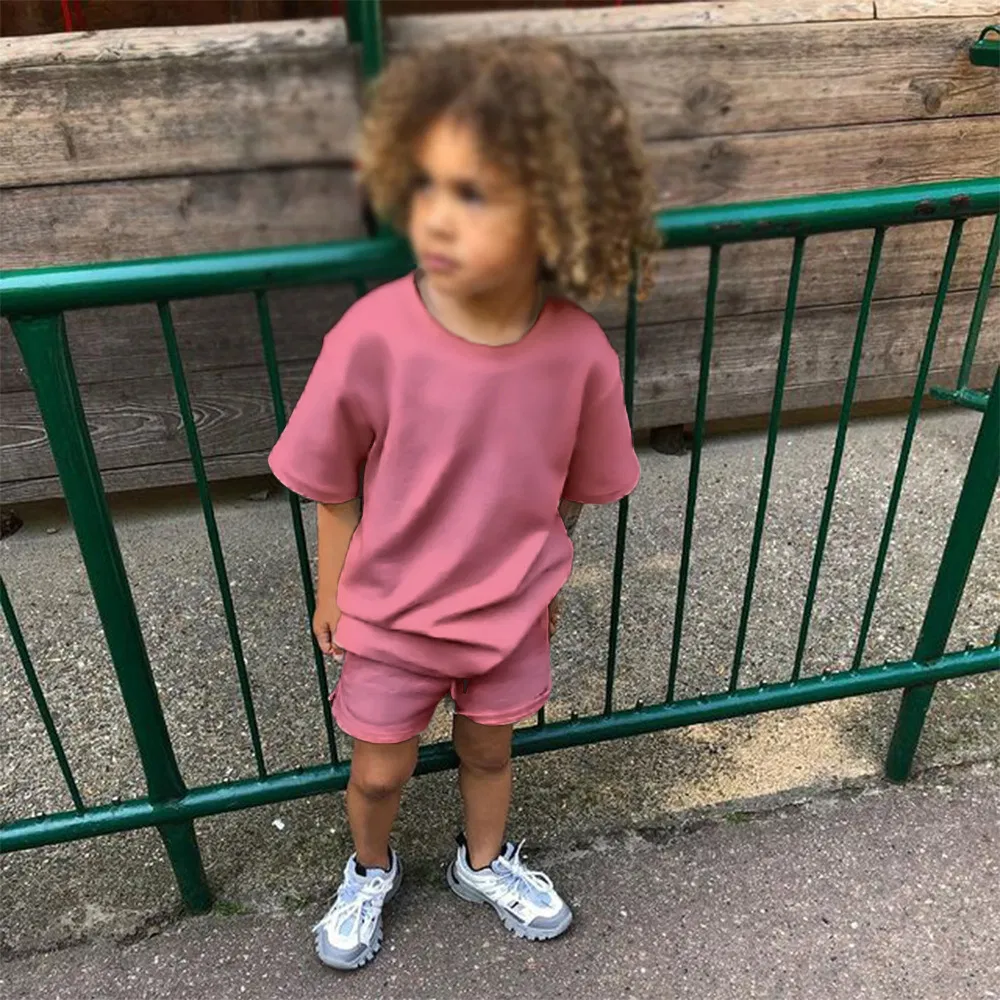 Conjunto de camiseta de manga corta y pantalones cortos de algodón puro de color sólido para niños y niñas, ropa de verano para niños, chándal personalizado para niños