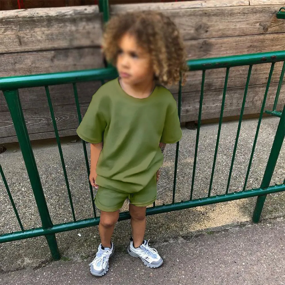 Ropa al por mayor OEM para niños y niñas, camiseta de verano y pantalones cortos 100% ropa de algodón, ropa casual para niños, chándales para niños