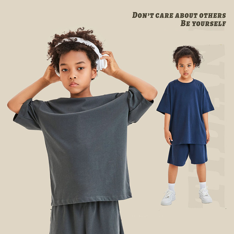 Venta al por mayor 2024 Camiseta personalizada de verano para niños y niñas 230g 100% Camiseta de algodón con hombros caídos, básica y de gran tamaño para niños, ropa de moda infantil