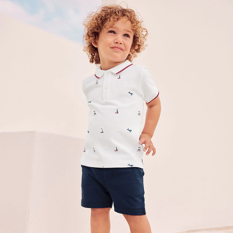 Polo de manga corta de color blanco personalizado para niños y. Pantalón corto azul marino 2pcs conjunto ropa de verano para niños