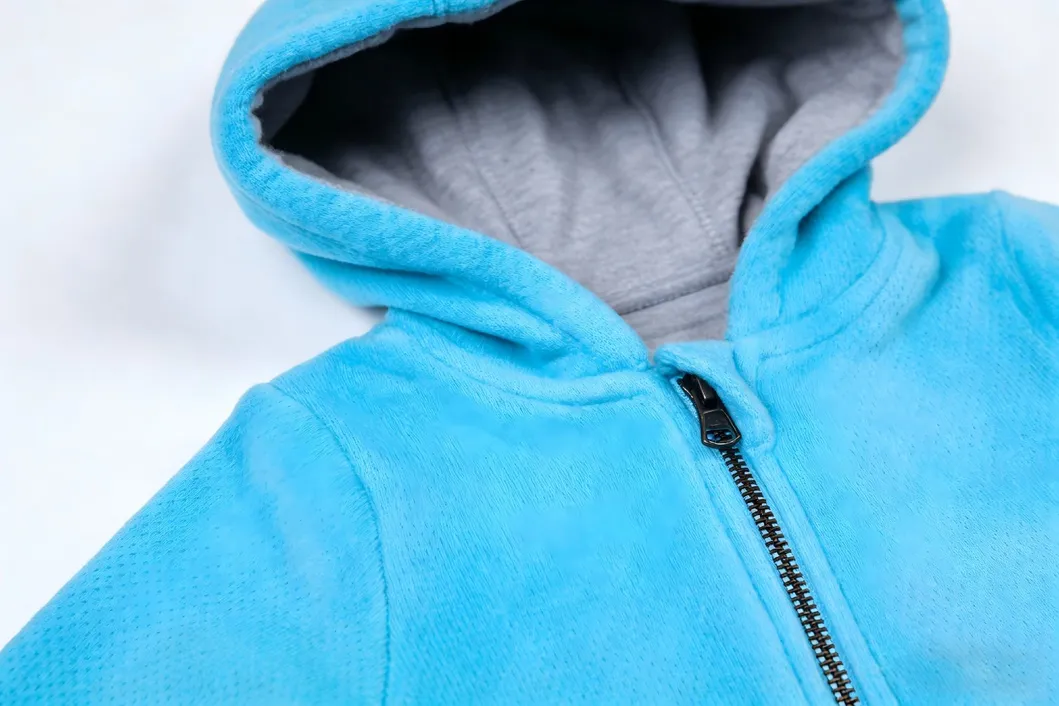 Producción por lotes chaquetas bebé