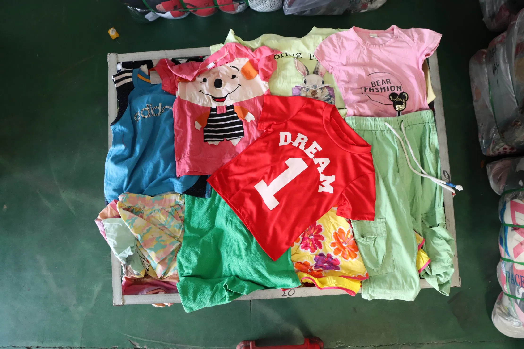 Camiseta de verano para mujeres de manga corta, cuello alto, elástica, de algodón, hecha en China, ropa de segunda mano