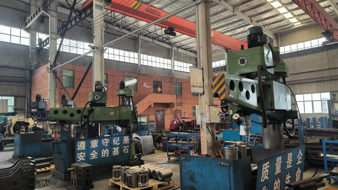 Precision drilling operation during lifting equipment component manufacturing