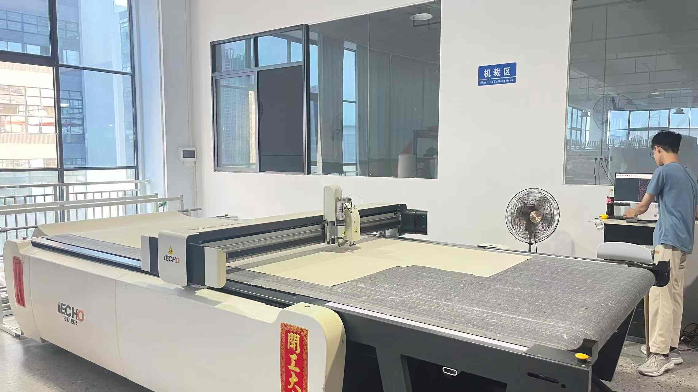 Laser precision fabric cutting for accurate upholstery pattern matching