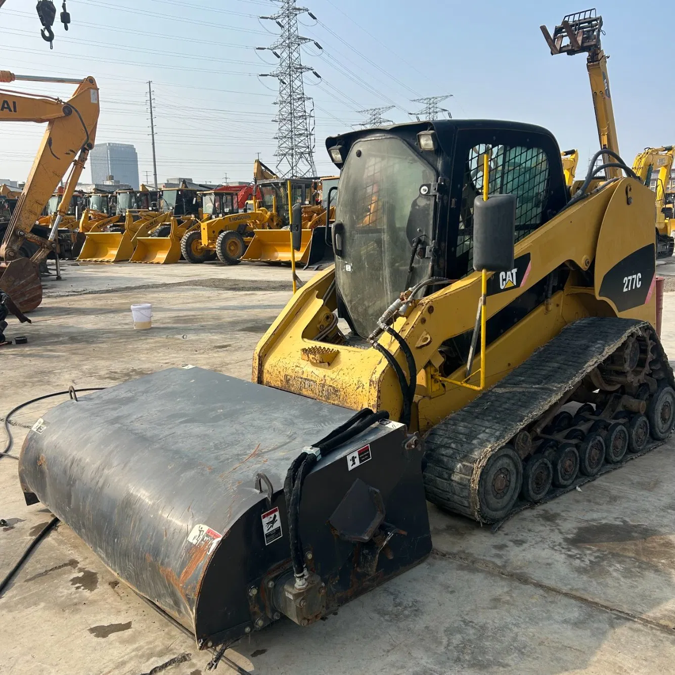 Cargadora de Oruga Caterpillar Original Usada 277c Cargadora de Ruedas Skid Steer de Segunda Mano 226b 246c 262D 246D Mini Cargadora de Oruga con Barrendero Bobcat S160 S16