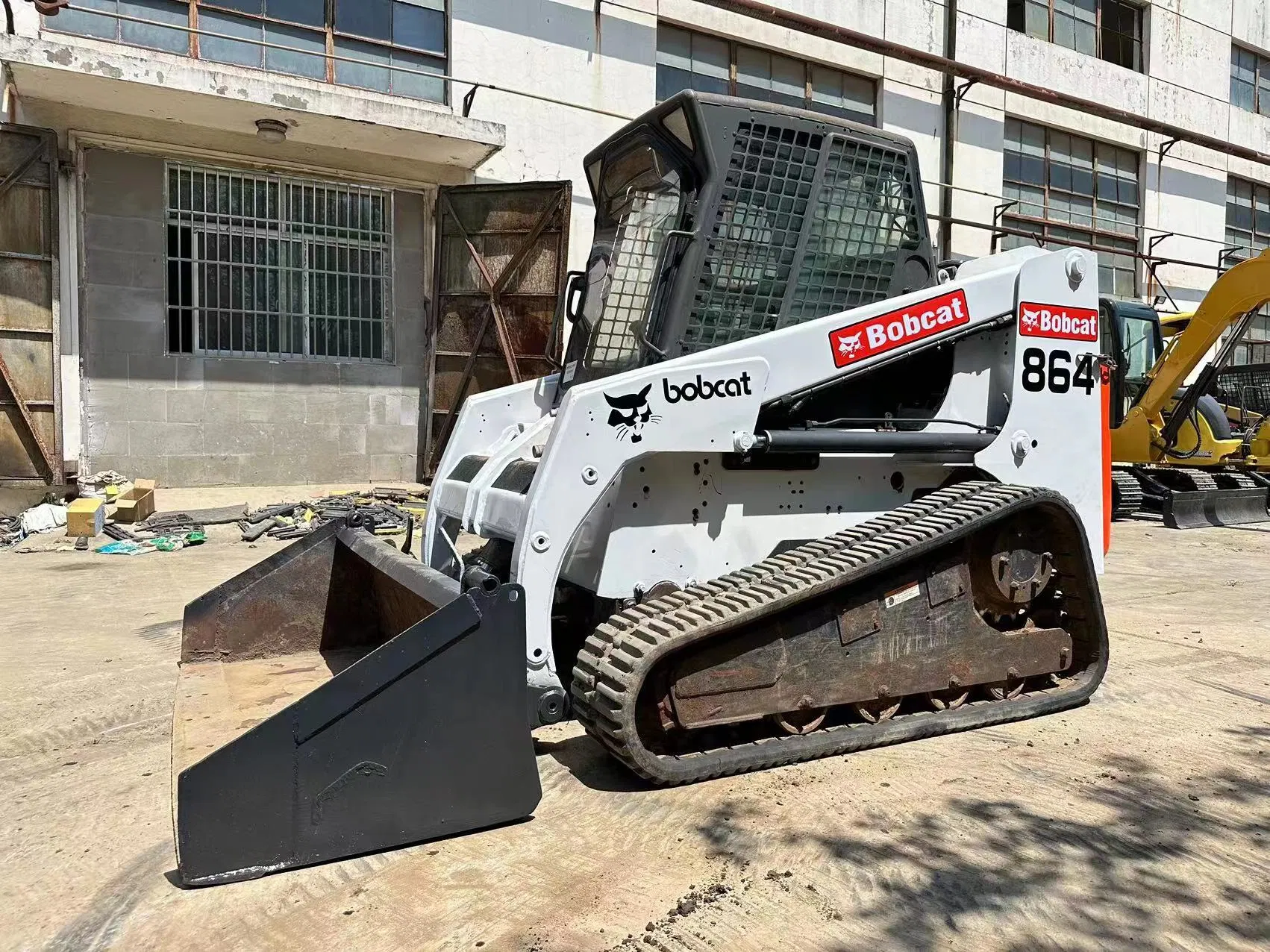 Cargadora de orugas de segunda mano original 864 usada en EE. UU. Bobcat mini cargadora