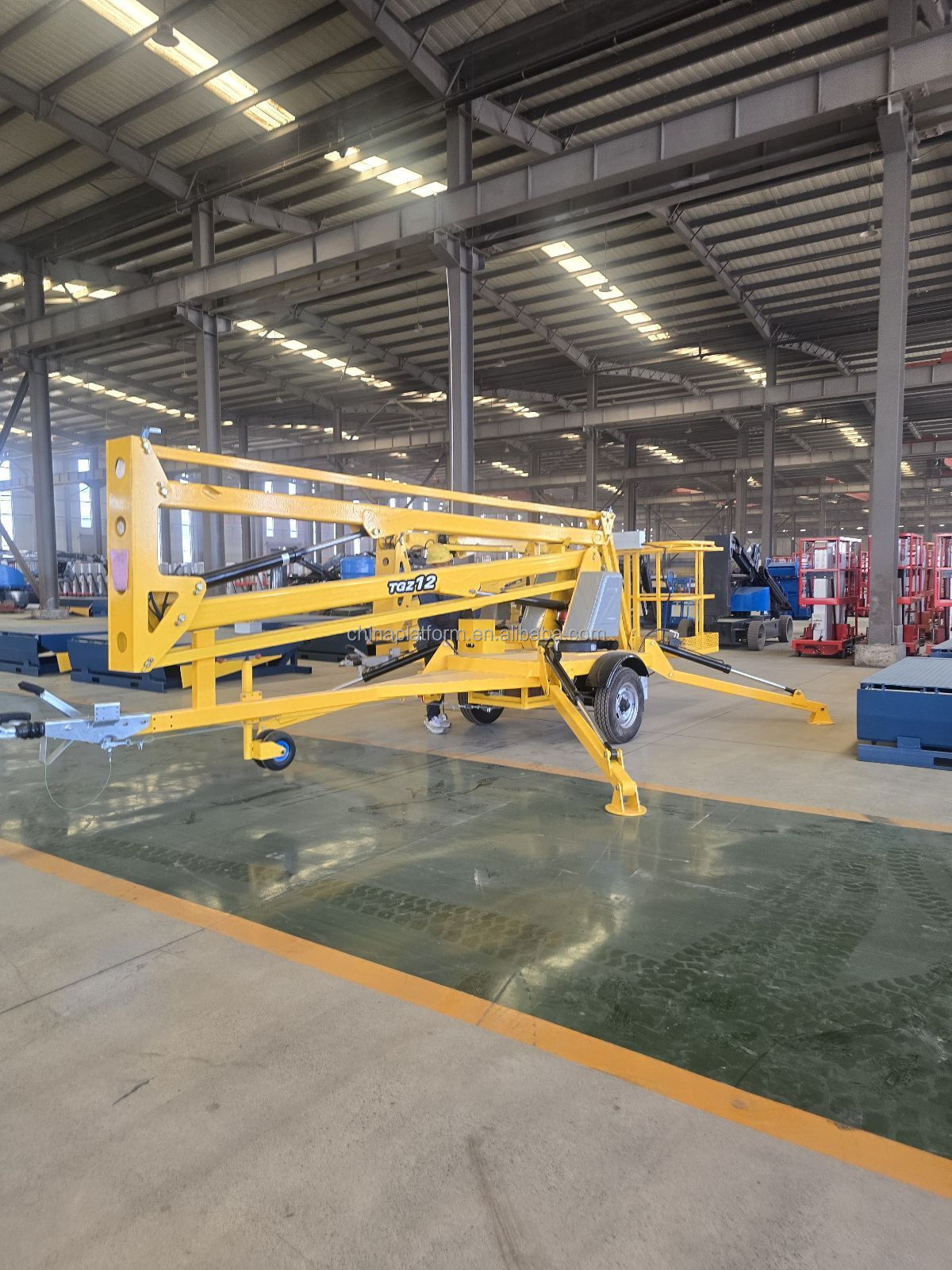 Flexible Towable Boom Lift Versatile Terrain Adaptability Aerial Work Wide Reach Height