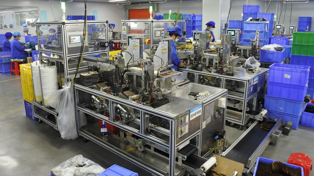 Kofi Beauty lamination machine for premium skincare product packaging