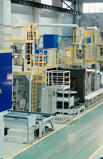 KOSHIN shot peening equipment manufacturing workshop