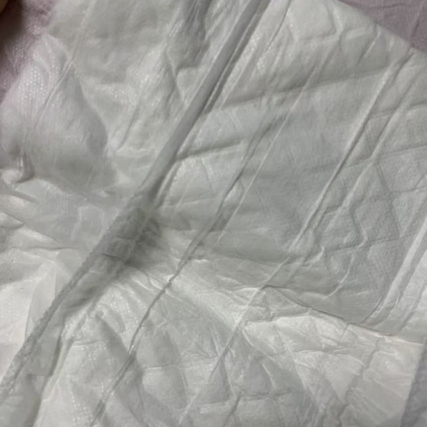 Amigável para a pele, macio, higiênico e conveniente absorvente em forma de T para uso diário de fraldas para incontinência