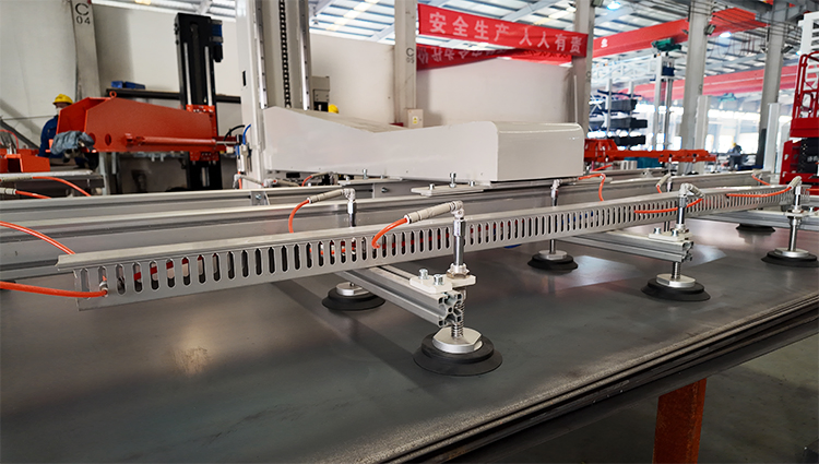 Labor Saving Robotic Arm for Automated Sheet Loading and Transport