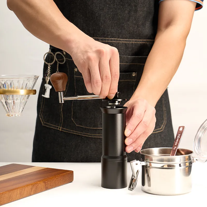 Cuerpo de aleación de aluminio 420 molinillo de café manual de acero inoxidable con mango plegable para uso doméstico