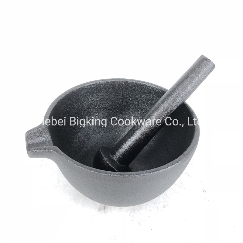 Utensilios de cocina mortero y mano de hierro fundido