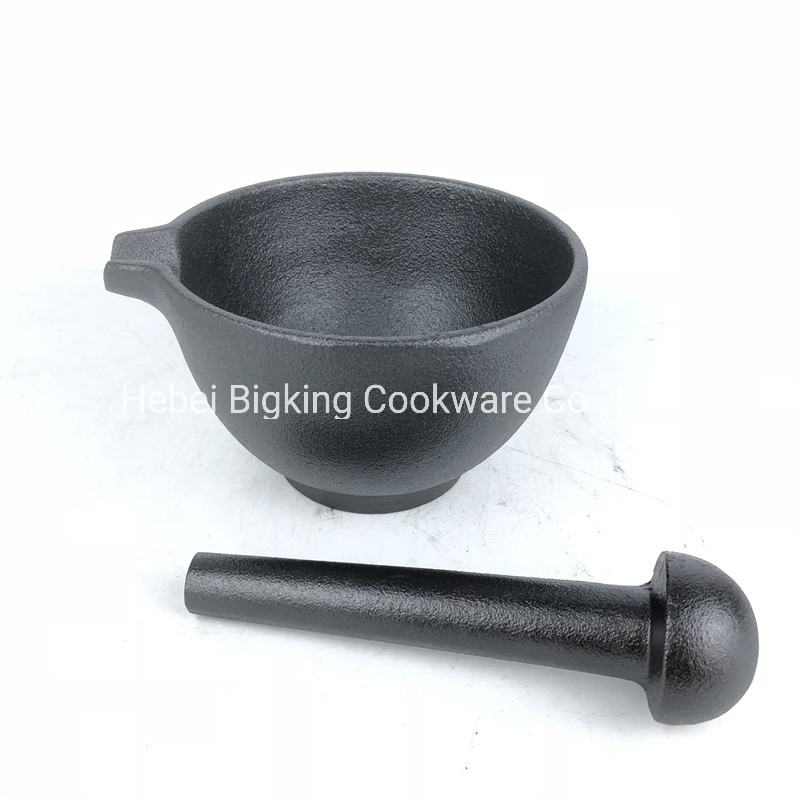 Utensilios de cocina mortero y mano de hierro fundido