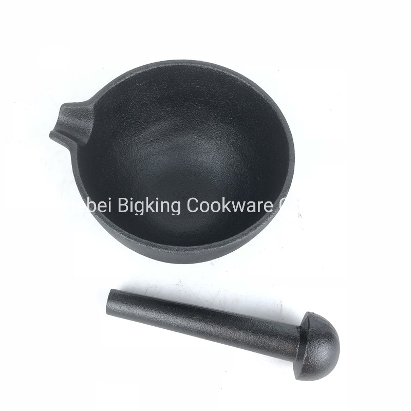Utensilios de cocina mortero y mano de hierro fundido