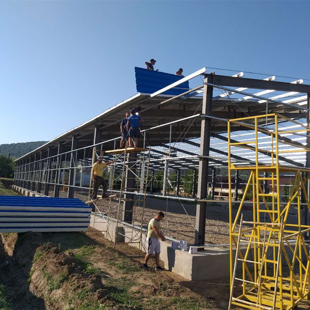 Galvanized/Painted Hangar/Garage/Storage/Shed Metal Construction Prefab/Prefabricated Design Frame Workshop/Warehouse Steel Structure for Industrial Building