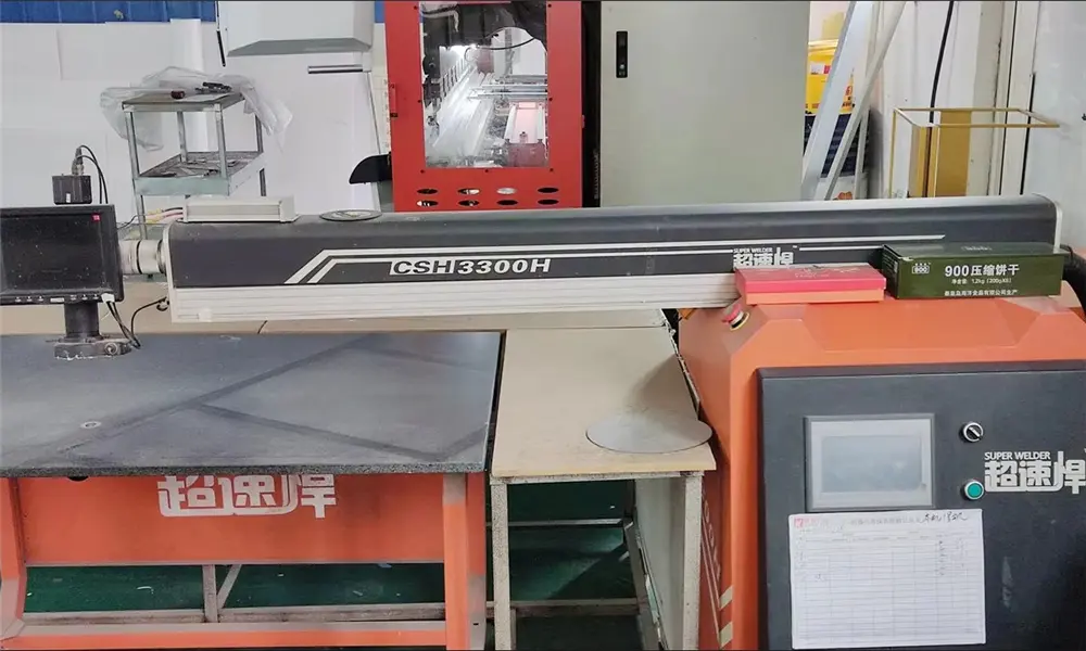 Laser welding machine for seamless joining of metal sign components
