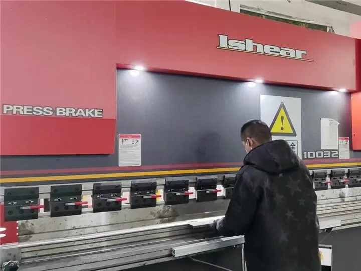 Metal bending process step for forming channel letter returns using precision bending machine