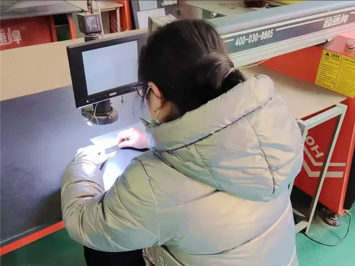 Laser welding process for seamless metal sign assembly and finishing