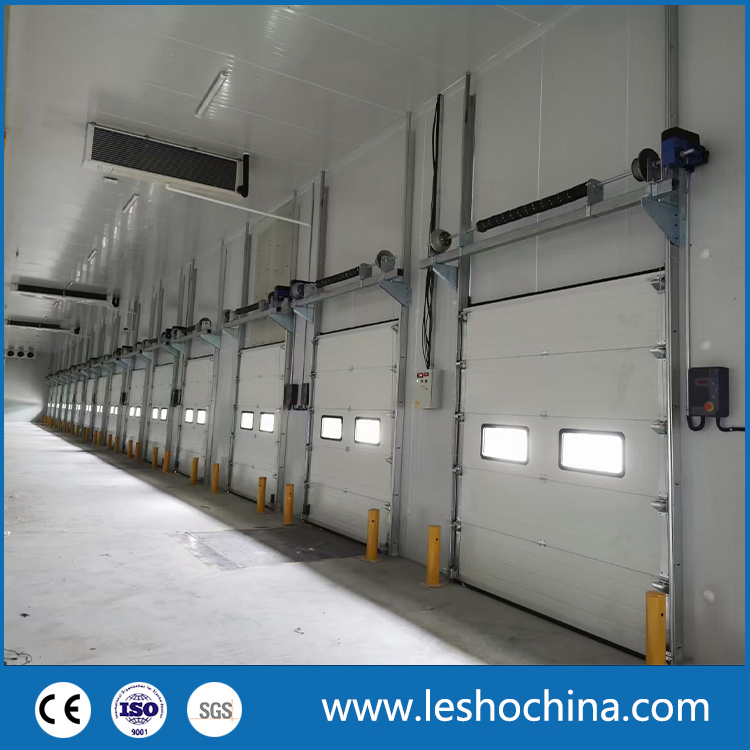 Industrial Automatic Motorized Electrical Sectional Vertical Insulated PU Sliding up Overhead Lifting Rolling up Dock Garage Door for Warehouse Loading Area Bay