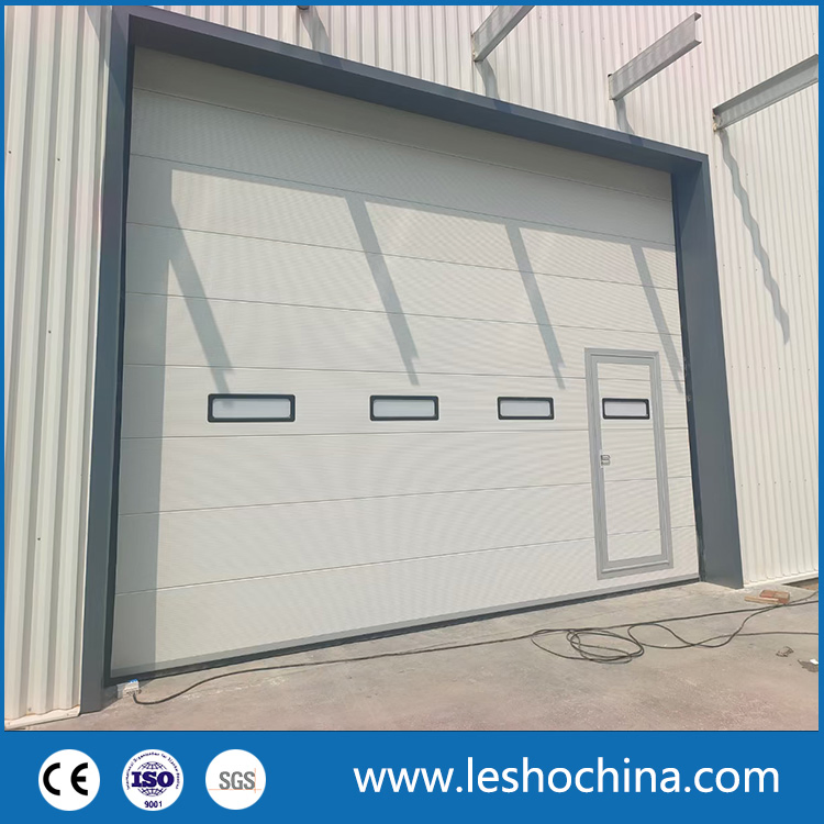 Industrial Automatic Motorized Electrical Sectional Vertical Insulated PU Sliding up Overhead Lifting Rolling up Dock Garage Door for Warehouse Loading Area Bay
