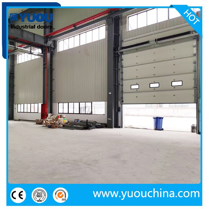 Industrial Automatic Thermal Insulated Metal Sandwich Panel Steel Exterior Sliding Lifting Dock Overhead Sectional Door for Warehouse Loading Area