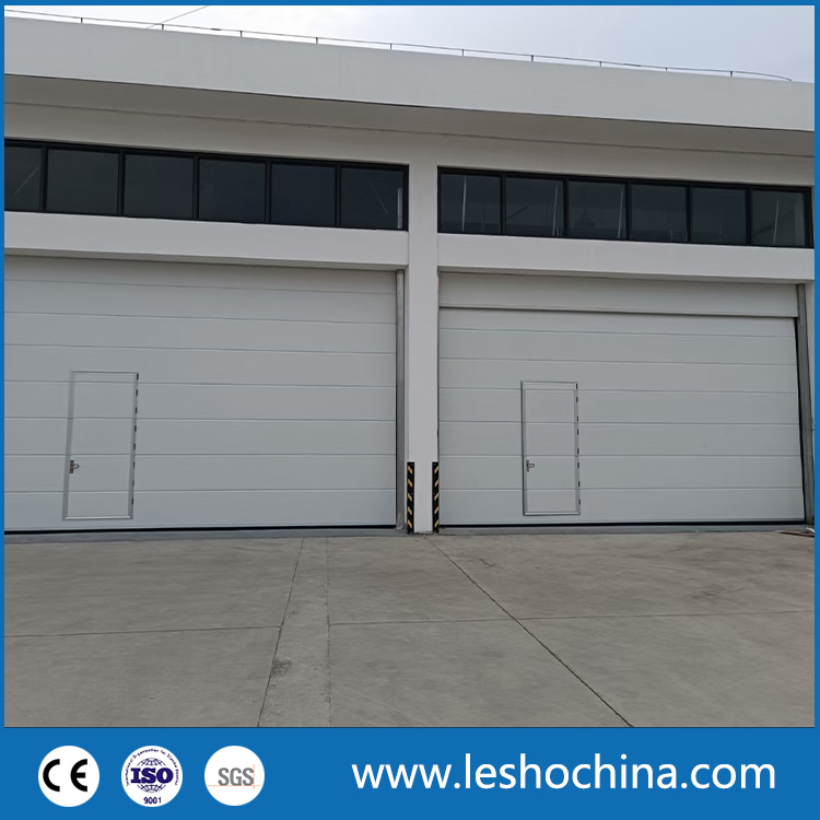 Big Door Opening Size Wind Resistant Industrial Lift Overhead Sectional Sliding Door PU Foam Insulated Vertical High Lifting Gate for Factory Warehouse