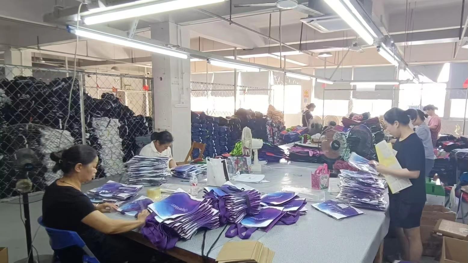 Professional packaging process at LAHD for finished gift bags ready for export