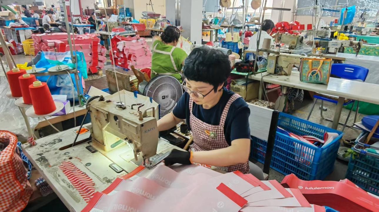 Industrial sewing machine type 1 at LAHD for precision stitching of fabric gift bags