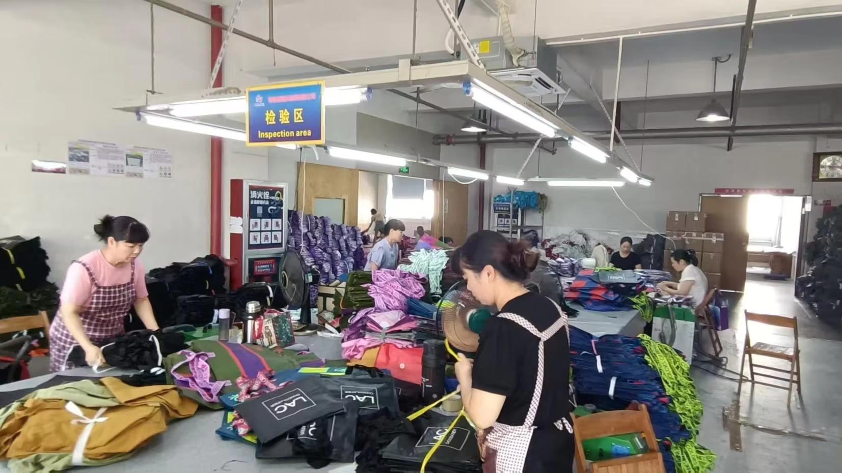 Quality inspection process at LAHD Bag manufacturing facility ensuring product standards