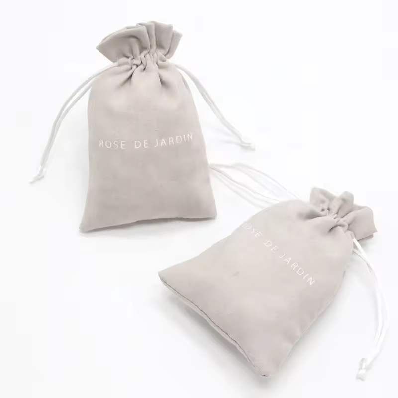 Wholesale Small Packaging Pouch Soft Fabric Drawstring Jewelry Pouch Logo Printing Faux Suede Jewelry Bag