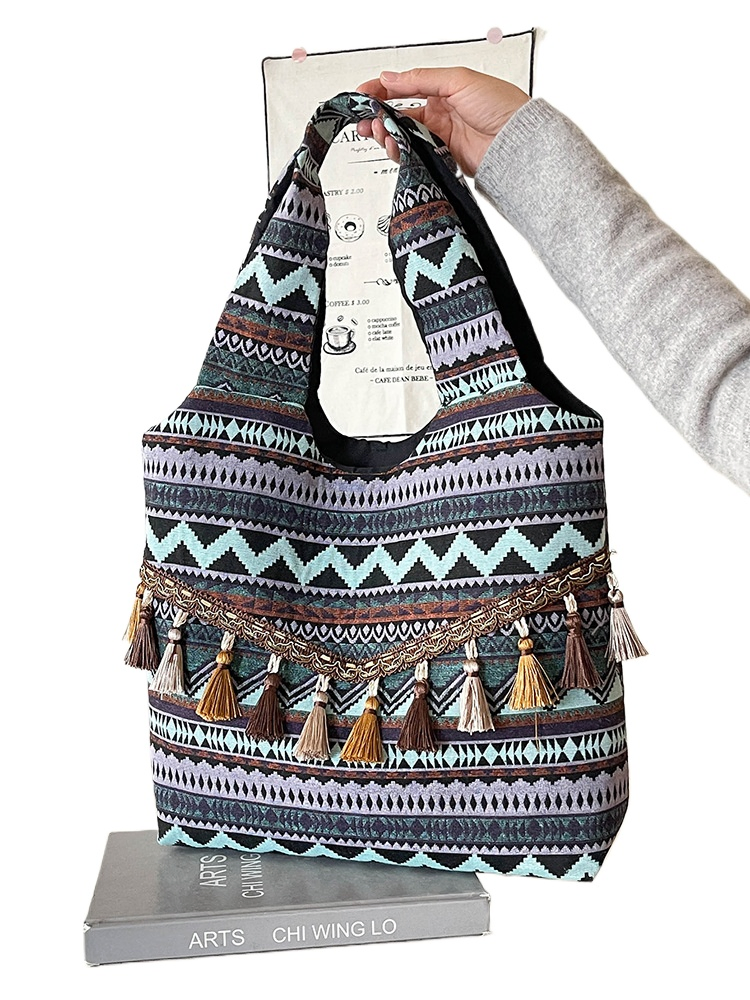 Nuevo estilo étnico bolso de gran capacidad con cierre abierto forro de poliéster correa de hombro personalizada con borlas bolso bohemio para mujeres