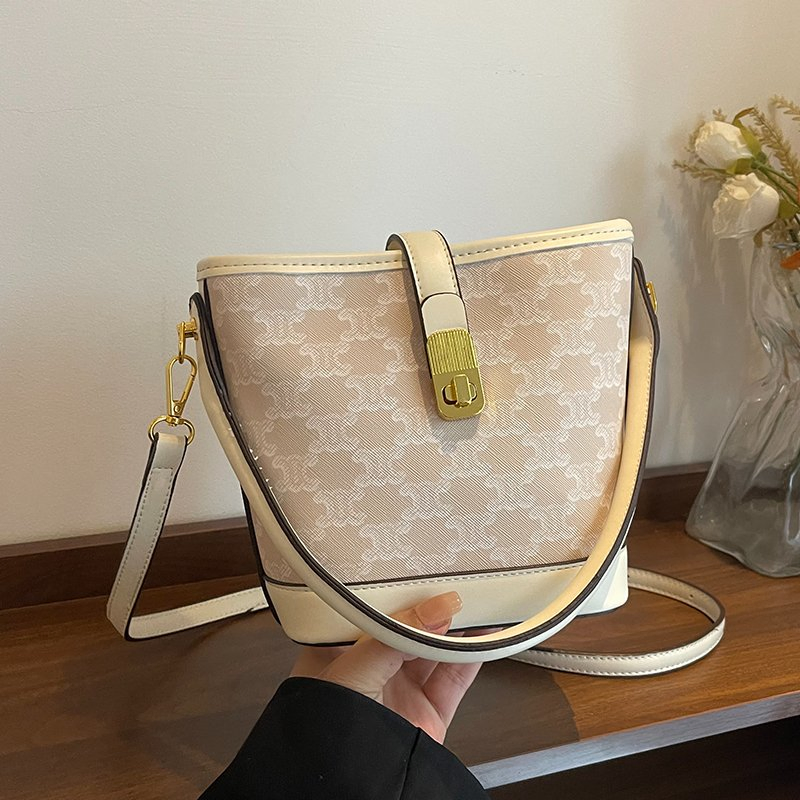 Bolso de mano de lujo de cuero PU cruzado de moda para mujeres, bolso tipo cubo para mujeres, distribuidor del mercado mayorista, fabricante OEM, Guangzhou