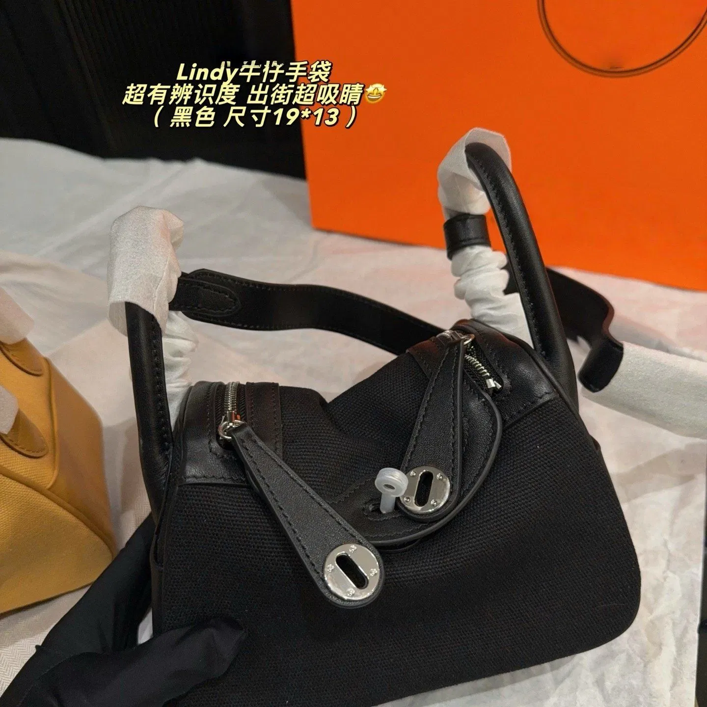 Bolso de mano mini Lindy de lujo en lona y cuero Tamaño 19*13cm Dos colores amarillo y negro con herrajes de cierre de giro plateados, asa superior, bandolera, bolso de mujer, cartera de dama