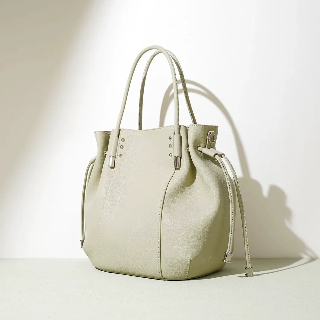 Venta al por mayor de fábrica diseño personalizado tamaño alta calidad textura de cuero genuino bolso para mujeres