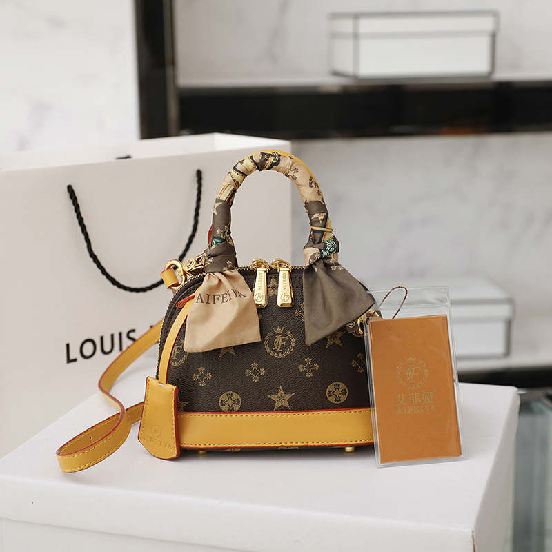 Ofertas directas de fábrica de moda vegana bolso de lujo de cuero bolso cruzado de hombro bolsas impresas de concha estilo