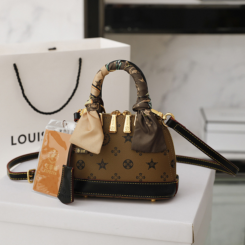 Ofertas directas de fábrica de moda vegana bolso de lujo de cuero bolso cruzado de hombro bolsas impresas de concha estilo