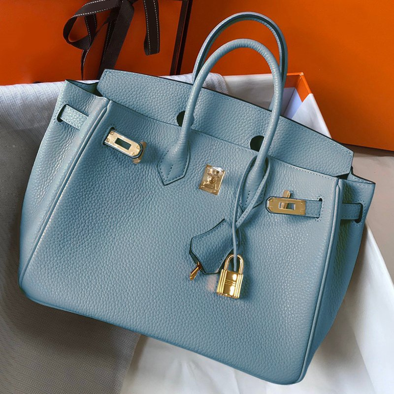 Tienda en línea de réplicas de bolsas de lujo de diseñador para mujeres, de alta calidad, con encanto de piel de vaca, tote de cuero genuino, bolso de mano