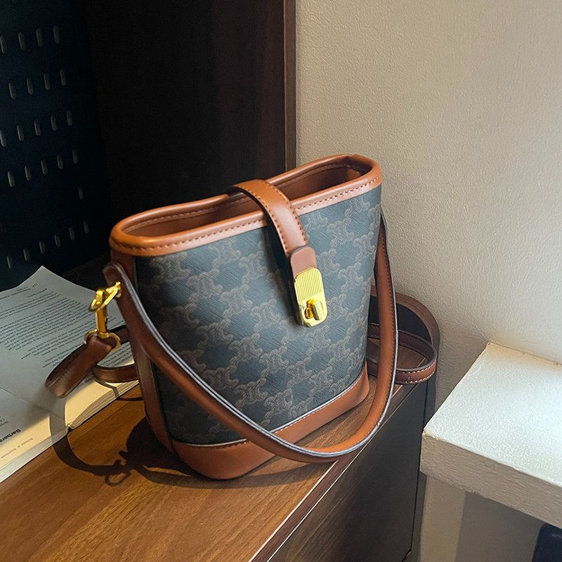 Bolso de mano de lujo de cuero PU cruzado de moda para mujeres, bolso tipo cubo para mujeres, distribuidor del mercado mayorista, fabricante OEM, Guangzhou