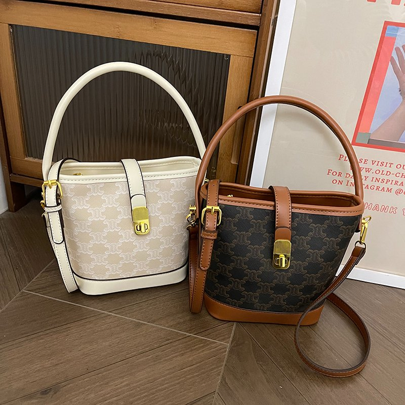Bolso de mano de lujo de cuero PU cruzado de moda para mujeres, bolso tipo cubo para mujeres, distribuidor del mercado mayorista, fabricante OEM, Guangzhou